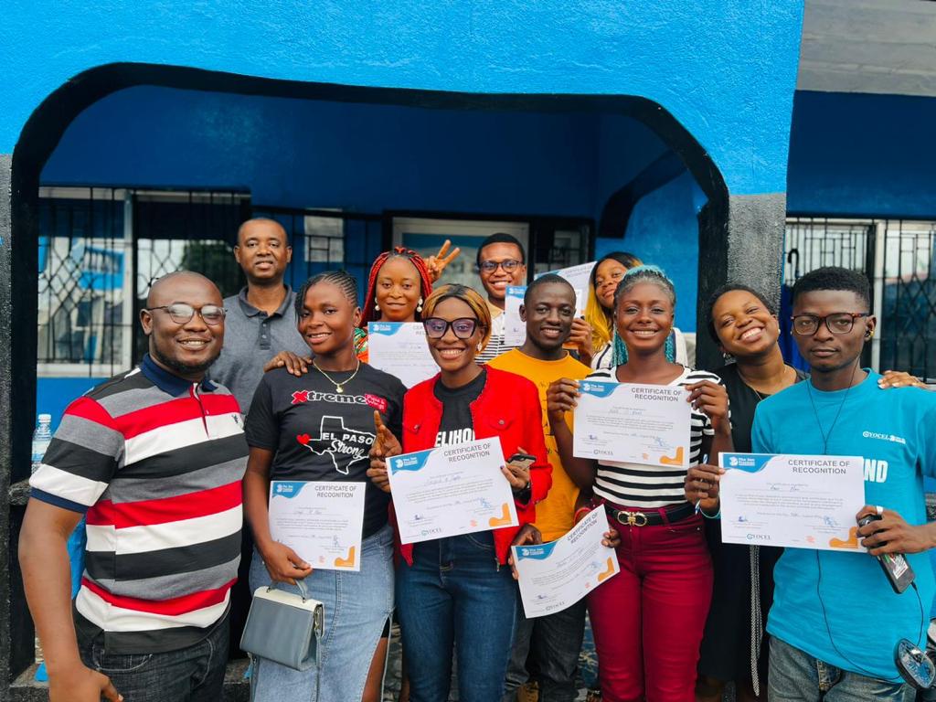 Group of grassroots activists holding pieces of paper