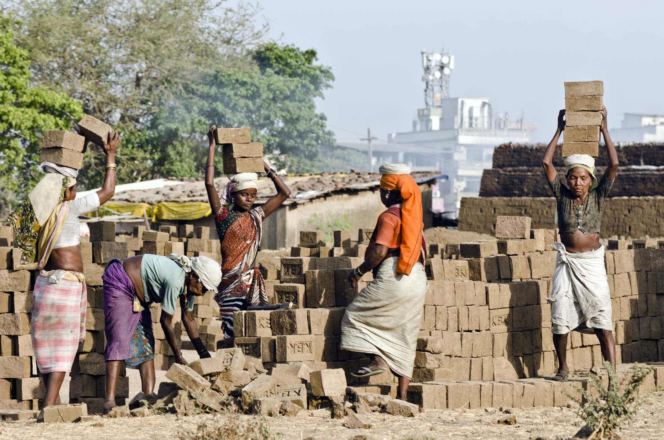 Women working at a brick kiln near Mumbai.